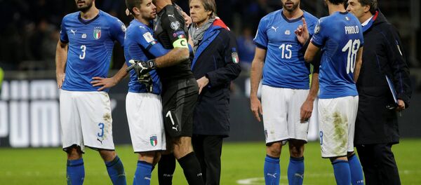 2018 World Cup Qualifications - Europe - Italy vs Sweden - San Siro, Milan, Italy - November 13, 2017 Italy’s Giorgio Chiellini, Gianluigi Buffon and Andrea Barzagli look dejected after the match 2018 World Cup Qualifications - Europe - Italy vs Sweden - San Siro, Milan, Italy - November 13, 2017 Italy’s Giorgio Chiellini, Gianluigi Buffon and Andrea Barzagli look dejected after the match - Sputnik International