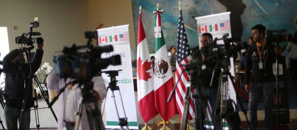 Journalists work during the fifth round of NAFTA talks involving the United States, Mexico and Canada, in Mexico City, Mexico, November 18, 2017 Journalists work during the fifth round of NAFTA talks involving the United States, Mexico and Canada, in Mexico City, Mexico, November 18, 2017 - Sputnik International