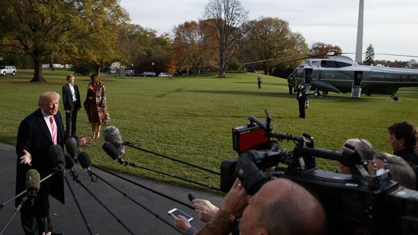President Donald Trump speaks to reporters before leaving the White House, Tuesday, Nov. 21, 2017, in Washington for a Thanksgiving trip to Mar-a-Lago estate in Palm Beach, Fla. - Sputnik International