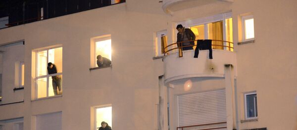 Migrants look at their windows in a former retirement house (image used for illustration purpose) Migrants look at their windows in a former retirement house (image used for illustration purpose) - Sputnik International