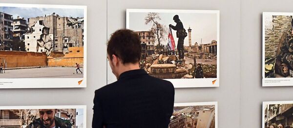 Opening of exhibiton, Syria: Photo Chronicles of War, in Strasbourg Opening of exhibiton, Syria: Photo Chronicles of War, in Strasbourg - Sputnik International