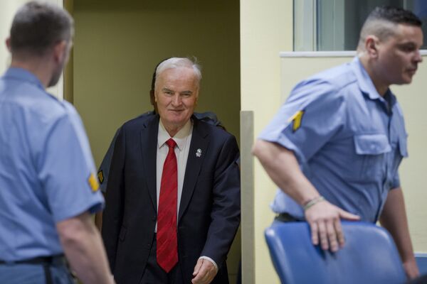 Bosnian Serb military chief Ratko Mladic enters the Yugoslav War Crimes Tribunal in The Hague, Netherlands, Wednesday, Nov. 22, 2017, to hear the verdict in his genocide trial Bosnian Serb military chief Ratko Mladic enters the Yugoslav War Crimes Tribunal in The Hague, Netherlands, Wednesday, Nov. 22, 2017, to hear the verdict in his genocide trial - Sputnik International