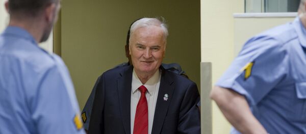 Bosnian Serb military chief Ratko Mladic enters the Yugoslav War Crimes Tribunal in The Hague, Netherlands, Wednesday, Nov. 22, 2017, to hear the verdict in his genocide trial Bosnian Serb military chief Ratko Mladic enters the Yugoslav War Crimes Tribunal in The Hague, Netherlands, Wednesday, Nov. 22, 2017, to hear the verdict in his genocide trial - Sputnik International
