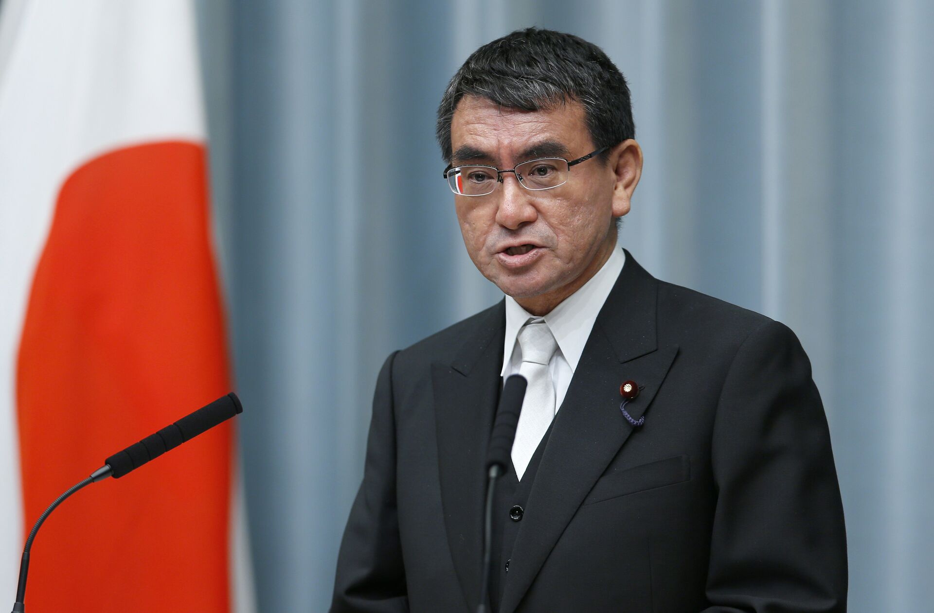 In this Aug. 3, 2017 file photo, Japan's Foreign Minister Taro Kono speaks during a press conference at the prime minister's official residence in Tokyo - Sputnik International, 1920, 16.09.2021