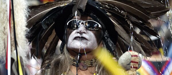 A Native American dancer participates during the Grand Entry of the 43rd Annual Denver March Powwow held at the Denver Coliseum on March 25, 2017 in Denver, Colorado A Native American dancer participates during the Grand Entry of the 43rd Annual Denver March Powwow held at the Denver Coliseum on March 25, 2017 in Denver, Colorado - Sputnik International