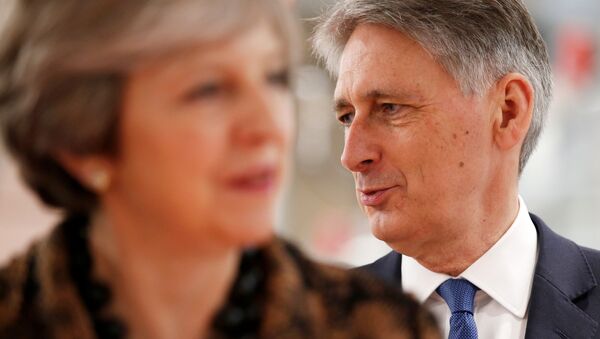 Britain's Prime Minister Theresa May and Chancellor of the Exchequer Philip Hammond visit an engineering training facility in the West Midlands, November 20, 2017. - Sputnik International