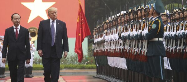 President Donald Trump, second from left, and Vietnamese President Tran Dai Quang review honor guard during an arrival ceremony at the Presidential Palace, Sunday, Nov. 12, 2017, in Hanoi, Vietnam. President Donald Trump, second from left, and Vietnamese President Tran Dai Quang review honor guard during an arrival ceremony at the Presidential Palace, Sunday, Nov. 12, 2017, in Hanoi, Vietnam. - Sputnik International