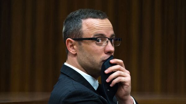 FILE - In this photograph taken on Tuesday, May 19, 2014, Oscar Pistorius listens to psychiatric evidence for his defense, during his ongoing murder trial in Pretoria, South Africa - Sputnik International