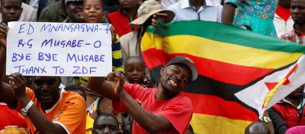 People wait for the inauguration ceremony to swear in Zimbabwe's former vice president Emmerson Mnangagwa as president in Harare, Zimbabwe, November 24, 2017 People wait for the inauguration ceremony to swear in Zimbabwe's former vice president Emmerson Mnangagwa as president in Harare, Zimbabwe, November 24, 2017 - Sputnik International