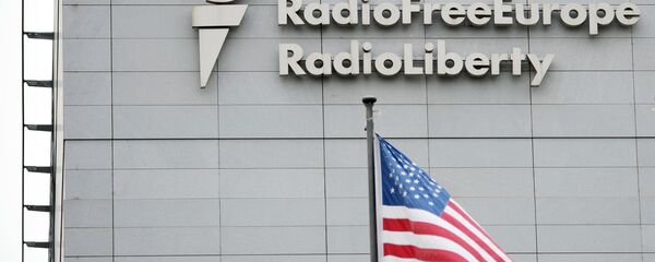 A sign on the headquarters of Radio Free Europe / Radio Liberty international broadcasting organization in Prague - Sputnik International