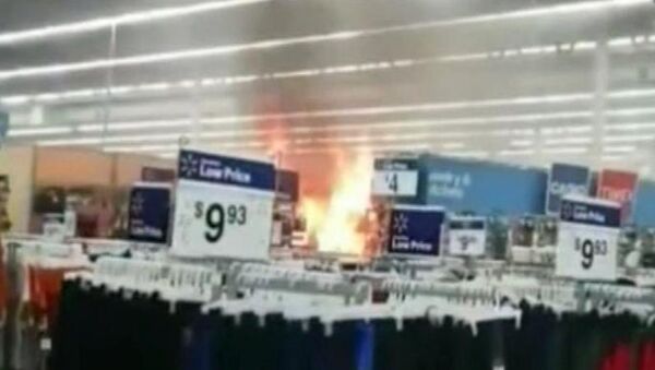 youtube screengrab of fire set inside Texas Walmart store - Sputnik International