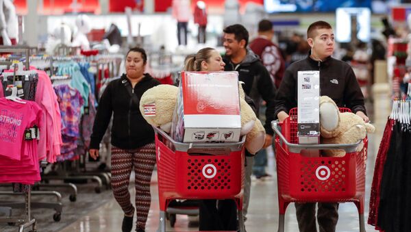 Customers navigate through the aisles during the Black Friday sales event on Thanksgiving Day at Target in Chicago, Illinois, U.S. November 23, 2017 - Sputnik International