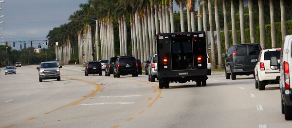 The motorcade of U.S. President Donald Trump arrives at Trump International Golf Club in West Palm Beach, Florida, U.S., November 25, 2017 - Sputnik International