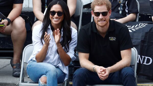 Britain's Prince Harry and his girlfriend actress Meghan Markle watch the wheelchair tennis event during the Invictus Games in Toronto, Ontario, Canada September 25, 2017. - Sputnik International