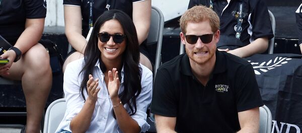 Britain's Prince Harry and his girlfriend actress Meghan Markle watch the wheelchair tennis event during the Invictus Games in Toronto, Ontario, Canada September 25, 2017. Britain's Prince Harry and his girlfriend actress Meghan Markle watch the wheelchair tennis event during the Invictus Games in Toronto, Ontario, Canada September 25, 2017. - Sputnik International