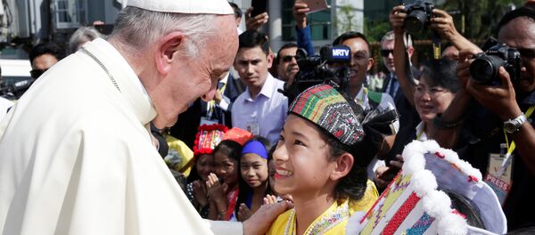 Pope Francis is welcomed as he arrives at Yangon International Airport, Myanmar Pope Francis is welcomed as he arrives at Yangon International Airport, Myanmar - Sputnik International