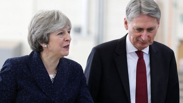 Britain's Prime Minister Theresa May and Finance Minister Philip Hammond visit Leeds College of Building, Leeds, Britain, November 23, 2017 - Sputnik International