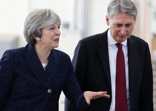 Britain's Prime Minister Theresa May and Chancellor of the Exchequer Philip Hammond visit Leeds College of Building, Leeds, Britain, November 23, 2017 - Sputnik International