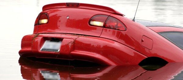 Car sinking in high water Car sinking in high water - Sputnik International