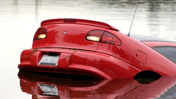 Car sinking in high water - Sputnik International