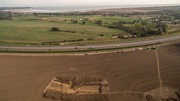 View of the University of Leicester excavations at Ebbsfleet in 2016 showing Pegwell Bay and the cliffs at Ramsgate View of the University of Leicester excavations at Ebbsfleet in 2016 showing Pegwell Bay and the cliffs at Ramsgate - Sputnik International