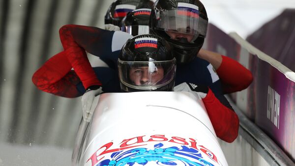 Alexander Kasyanov, Ilvir Khuzin, Maxim Belugin and Alexey Pushkarev (Russia) at the finish of the third heat of the four-man bobsleigh competition at the XXII Olympic Winter Games in Sochi. (File) - Sputnik International