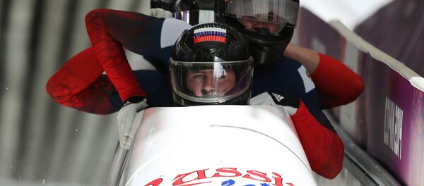 Alexander Kasyanov, Ilvir Khuzin, Maxim Belugin and Alexey Pushkarev (Russia) at the finish of the third heat of the four-man bobsleigh competition at the XXII Olympic Winter Games in Sochi. (File) - Sputnik International