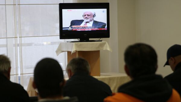 Slobodan Praljak is seen during television broadcast of the appeal trial in the Hague, Netherlands, for six Bosnian Croat senior wartime officials accused of war crimes against Muslims in Bosnia's 1992-1995 war, in Mostar, Bosnia and Herzegovina - Sputnik International