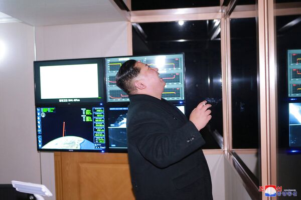 North Korea's leader Kim Jong-un is seen as the newly developed intercontinental ballistic rocket Hwasong-15's test was successfully launched, in this undated photo released by North Korea's Korean Central News Agency (KCNA) in Pyongyang November 30, 2017 North Korea's leader Kim Jong-un is seen as the newly developed intercontinental ballistic rocket Hwasong-15's test was successfully launched, in this undated photo released by North Korea's Korean Central News Agency (KCNA) in Pyongyang November 30, 2017 - Sputnik International