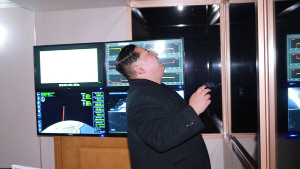 North Korea's leader Kim Jong-un is seen as the newly developed intercontinental ballistic rocket Hwasong-15's test was successfully launched, in this undated photo released by North Korea's Korean Central News Agency (KCNA) in Pyongyang November 30, 2017 - Sputnik International