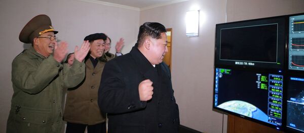 North Korea's leader Kim Jong-un is seen as the newly developed intercontinental ballistic rocket Hwasong-15's test was successfully launched, in this undated photo released by North Korea's Korean Central News Agency (KCNA) in Pyongyang November 30, 2017 North Korea's leader Kim Jong-un is seen as the newly developed intercontinental ballistic rocket Hwasong-15's test was successfully launched, in this undated photo released by North Korea's Korean Central News Agency (KCNA) in Pyongyang November 30, 2017 - Sputnik International