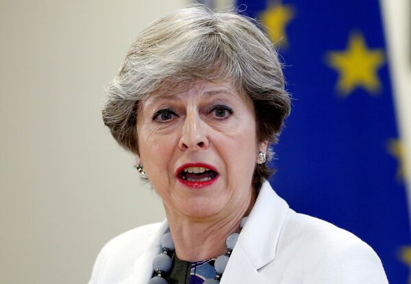 Britain's Prime Minister Theresa May addresses a news conference during an European Union leaders summit in Brussels, Belgium, October 20, 2017. Britain's Prime Minister Theresa May addresses a news conference during an European Union leaders summit in Brussels, Belgium, October 20, 2017. - Sputnik International