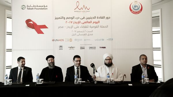 In this Saturday, Dec. 2, 2017 photo, from left to right UNAIDS country manager Ahmed Khamis, Christian father Boulos Soror, Dr. Walid Kamal, Islamic scholar and Sheik Ali al-Jifri, and Tabah Foundation member Mohammed Shahin, prepare for an even part of the World AIDS Day 2017 national advocacy campaign at a hotel, in Cairo, Egypt - Sputnik International