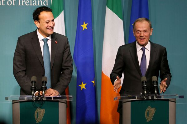 European Council President Donald Tusk (R) and Ireland's Prime Minister (Taoiseach) Leo Varadkar address a joint press conference at the Government buildings in Dublin European Council President Donald Tusk (R) and Ireland's Prime Minister (Taoiseach) Leo Varadkar address a joint press conference at the Government buildings in Dublin - Sputnik International