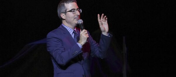 Comedian John Oliver performs on stage during the 11th Annual Stand Up for Heroes benefit, presented by the New York Comedy Festival and The Bob Woodruff Foundation, at the Theater at Madison Square Garden on Tuesday, Nov. 7, 2017, in New York Comedian John Oliver performs on stage during the 11th Annual Stand Up for Heroes benefit, presented by the New York Comedy Festival and The Bob Woodruff Foundation, at the Theater at Madison Square Garden on Tuesday, Nov. 7, 2017, in New York - Sputnik International