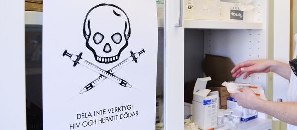 A nurse prepares a kit for drug addicts next to a sign that reads Do not share tools! HIV and Hepatitis kills at the needle exchange facility located in St Goeran's hospital in Stockholm on April 2, 2014 A nurse prepares a kit for drug addicts next to a sign that reads Do not share tools! HIV and Hepatitis kills at the needle exchange facility located in St Goeran's hospital in Stockholm on April 2, 2014 - Sputnik International