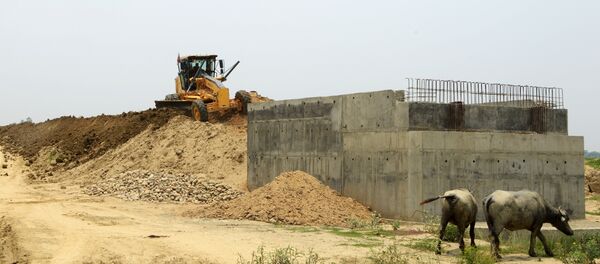 In this photograph taken on June 14, 2017, Indian labourers work at the construction area of the new railway in Janakpur, some 300km south of Kathmandu In this photograph taken on June 14, 2017, Indian labourers work at the construction area of the new railway in Janakpur, some 300km south of Kathmandu - Sputnik International