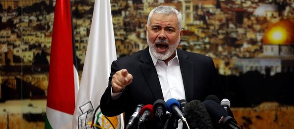 Hamas Chief Ismail Haniyeh gestures as he delivers a speech over U.S. President Donald Trump's decision to recognize Jerusalem as the capital of Israel, in Gaza City December 7, 2017 Hamas Chief Ismail Haniyeh gestures as he delivers a speech over U.S. President Donald Trump's decision to recognize Jerusalem as the capital of Israel, in Gaza City December 7, 2017 - Sputnik International