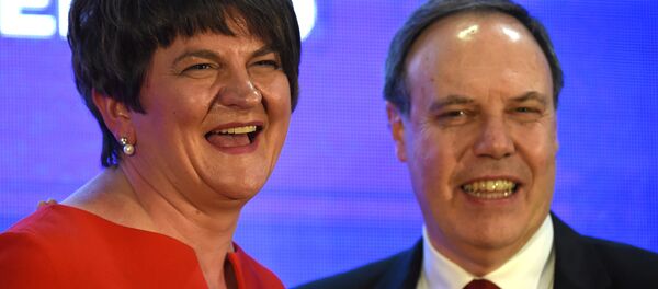 DUP leader Arlene Foster and deputy leader Nigel Dodds are seen after Arlene Fosters speech at her party's annual conference in Belfast, Northern Ireland, November 25, 2017. DUP leader Arlene Foster and deputy leader Nigel Dodds are seen after Arlene Fosters speech at her party's annual conference in Belfast, Northern Ireland, November 25, 2017. - Sputnik International
