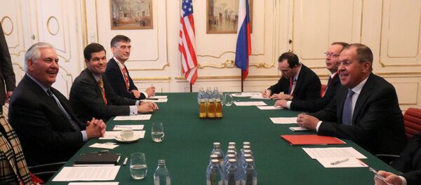 U.S. Secretary of State Rex Tillerson and Russia's Foreign Minister Sergei Lavrov attend a bilateral meeting during a ministerial council of OSCE Foreign Ministers in Vienna, Austria, December 7, 2017 - Sputnik International