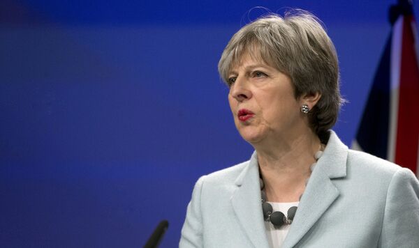 British Prime Minister Theresa May speaks during a media conference with European Commission President Jean-Claude Juncker at EU headquarters in Brussels on Friday, Dec. 8, 2017. British Prime Minister Theresa May speaks during a media conference with European Commission President Jean-Claude Juncker at EU headquarters in Brussels on Friday, Dec. 8, 2017. - Sputnik International
