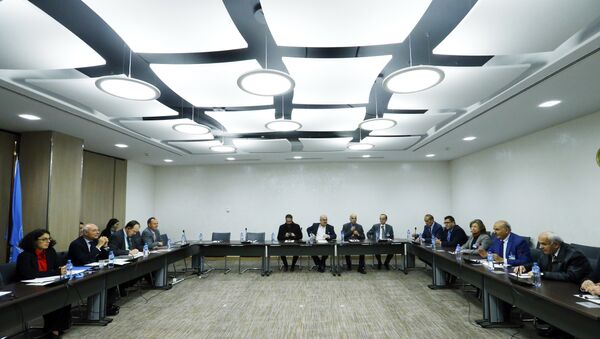 Members of the delegation of the Syrian Negotiation Commission (SNC) attend a meeting with United Nations Deputy Special Envoy for Syria Ramzy Ezzeldin Ramzy during the Intra Syria talks in Geneva, Switzerland - Sputnik International