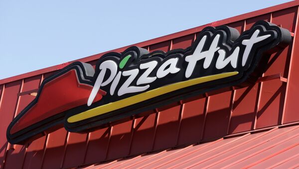 This Tuesday, Jan. 24, 2017, photo shows a Pizza Hut sign at a restaurant in Miami. - Sputnik International