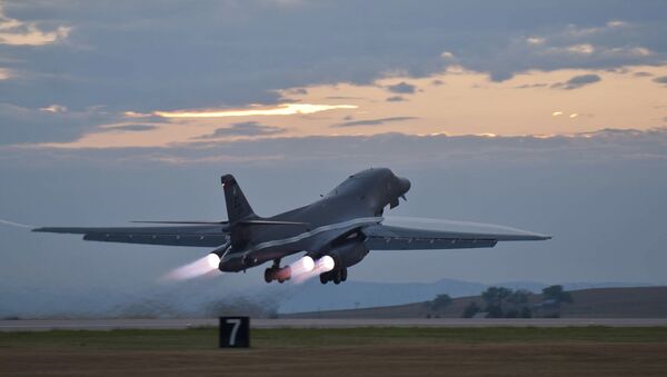 This July 24, 2012 photo provided by the U.S. Air Force shows a B-1 bomber rumbling down the flightline at Ellsworth Air Force Base, S.D., as part of a training mission - Sputnik International