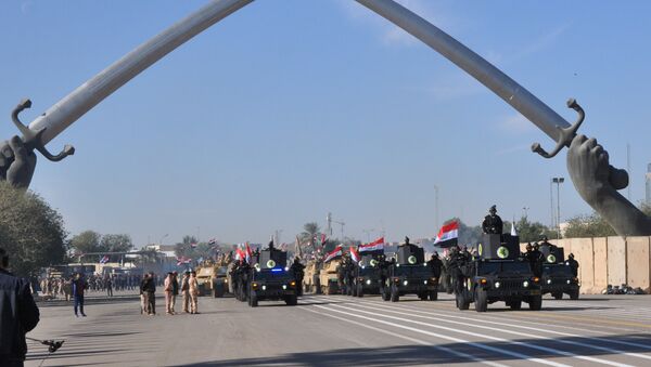 Military vehicles of Iraqi security forces are seen during an Iraqi military parade in Baghdad's fortified Green Zone, Iraq December 10, 2017 - Sputnik International