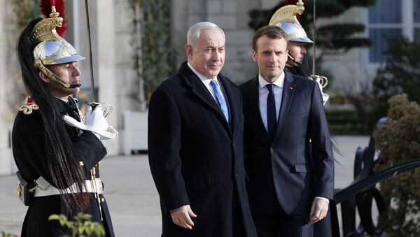 French President Emmanuel Macron, right, greets Israeli Prime Minister Benjamin Netanyahu before a meeting at the Elysee Palace in Paris, Sunday, Dec.10, 2017 - Sputnik International
