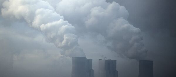 A brown coal power plant photographed in morning fog near Hoeningen, Germany, Monday, Nov. 6, 2017 - Sputnik International