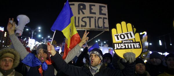 People take part in a demonstration in Bucharest, Romania, December 10, 2017. - Sputnik International