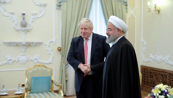 Britain's Foreign Secretary Boris Johnson meets with Iranian President Hassan Rouhani, in Tehran, Iran December 10, 2017 - Sputnik International