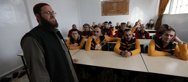 Former Islamic State members sit in a classroom at the Syrian Center for Combating Extremist Ideology in the town of Marea in northern Aleppo countryside, Syria, November 2, 2017. Picture taken November 2, 2017 Former Islamic State members sit in a classroom at the Syrian Center for Combating Extremist Ideology in the town of Marea in northern Aleppo countryside, Syria, November 2, 2017. Picture taken November 2, 2017 - Sputnik International